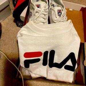 These gently used Fila tennis shoes with matching shirt (medium) is long sleeve.